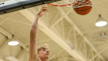 Iowa's Cooper Koch dunks during practice on July 15, 2024 at Carver-Hawkeye Arena in Iowa City, Iowa. (Rob Howe/HN) 