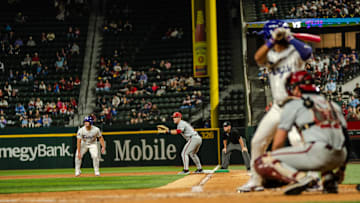 Karson Bowen with a leadoff at first base against Arkansas while Sam Myers is at the plate. 02/22/2025