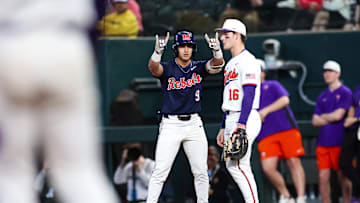 Ole Miss' Hayden Federico celebrates after gaining a hit in his first collegiate at-bat against the Clemson Tigers in the Shriners Children's College Showdown in Arlington, Texas.