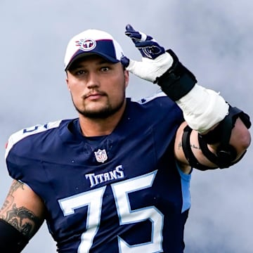 Tennessee Titans offensive tackle Dillon Radunz (75) heads to the field before a game against the Indianapolis Colts at Nissan Stadium in Nashville, Tenn., Sunday, Dec. 3, 2023.