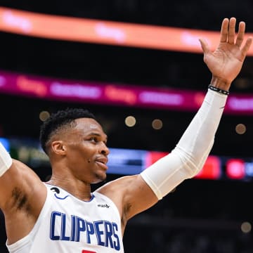 Mar 5, 2023; Los Angeles, California, USA; LA Clippers guard Russell Westbrook (0) celebrates against Memphis Grizzlies during fourth quarter at Crypto.com Arena. Mandatory Credit: Jonathan Hui-USA TODAY Sports