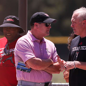Texas Tech director of athletics Kirby Hocutt (left) and football coach Joey McGuire 