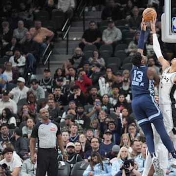 Victor Wembanyama blocks Jaren Jackson Jr. during a Spurs - Grizzlies game.