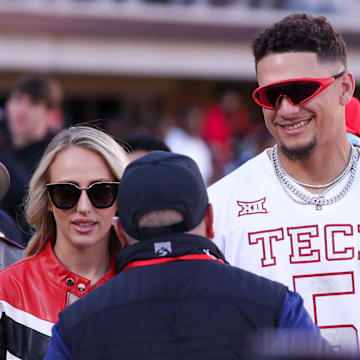 Patrick Mahomes (right) watched Texas Tech reach unprecedented heights Saturday.