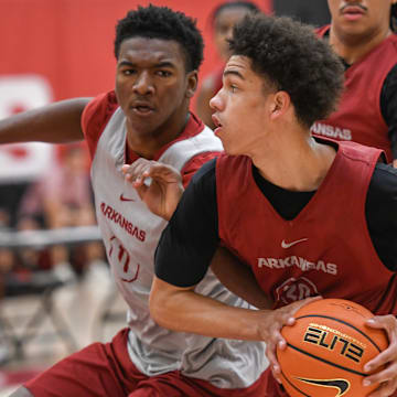 Razorbacks Karter Knox guards Isaiah Sealy at practice at the Eddie Sutton Practice Center in Fayetteville, Ark.
