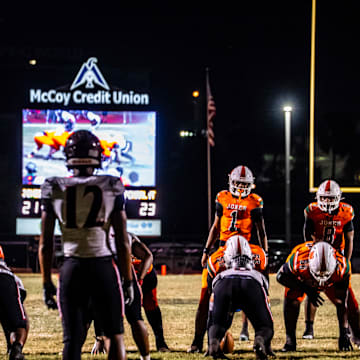 Jones quarterback Dereon Coleman (1), a Miami signee, completed 19 of 27 passes for 278 yards and two touchdowns and ran 13 times for 101 yards to power the defending Class 4A state runner-up Tigers past Port Charlotte, 35-23, in a state semifinal game on Friday, Dec. 5, 2025.