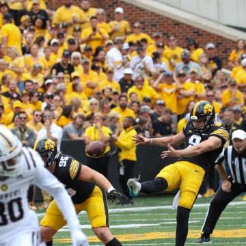Iowa's Tory Taylor punts during a game against Western Michigan in 2023. (Rob Howe/HN) 