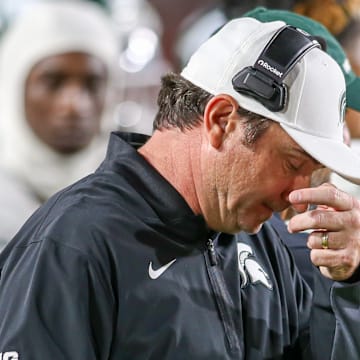 Michigan State head coach Jonathan Smith looks downward during the Spartans' game against USC on Sept. 20, 2025.