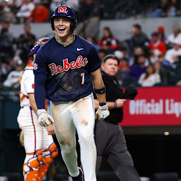 Ole Miss infielder Luke Hill reacts after hitting a home run against Clemson in the Shriners Children's College Showdown in Arlington, Texas.