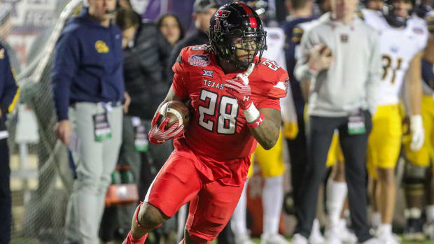 Texas Tech running back Tahj Brooks (28) rushing the football. Paul Karge/The Times / USA TODAY NETWORK