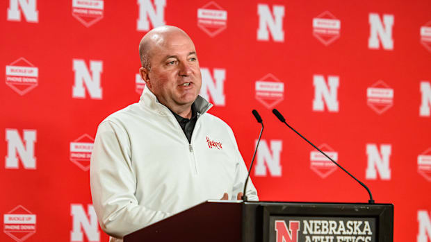 Athletic Director Troy Dannen speaks before introducing John Cook. 