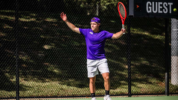 TCU's Roger Pascual celebrates as his win on Court 6 on Sunday clinched the Big 12 regular season title for the Horned Frogs.