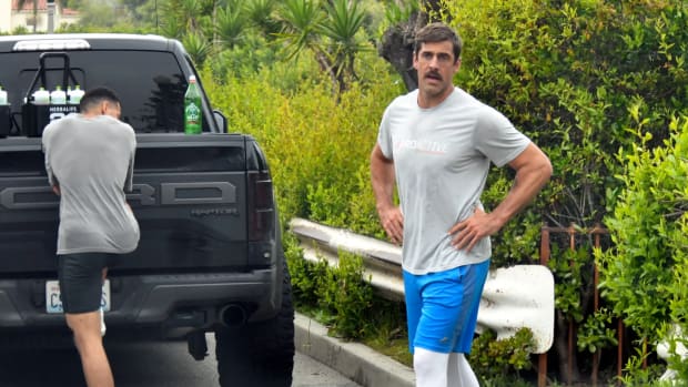Jets quarterback Aaron Rodgers looks to be getting back into shape as he is spotted doing a workout with the USC football team at the Santa Monica Stairs in Santa Monica, Calif.