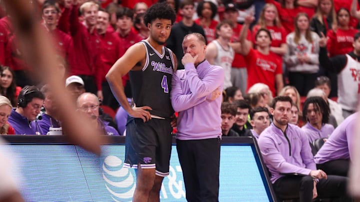 Kansas State interim head coach Matthew Driscoll talks to PJ Haggerty during a Big 12 Conference men's basketball game, Saturday, Feb. 21, 2026, in United Supermarkets Arena.