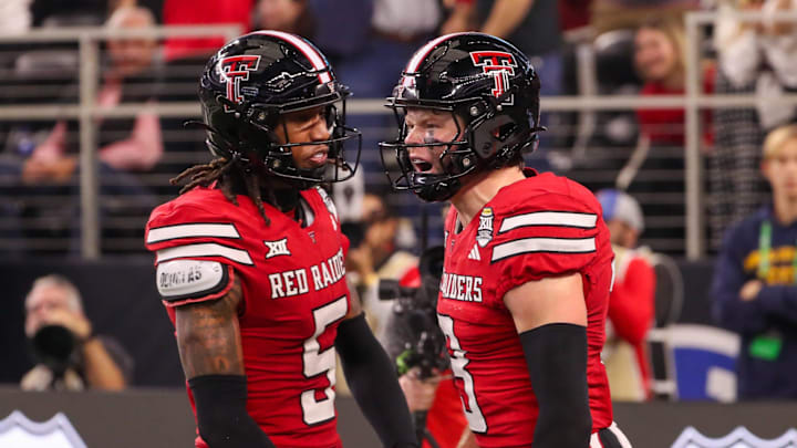 Texas Tech's Coy Eakin celebrates his touchdown against BYU with Caleb Douglas during the Big 12 Championship football game, Saturday, Nov. 6, 2025, at AT&T Stadium in Arlington.