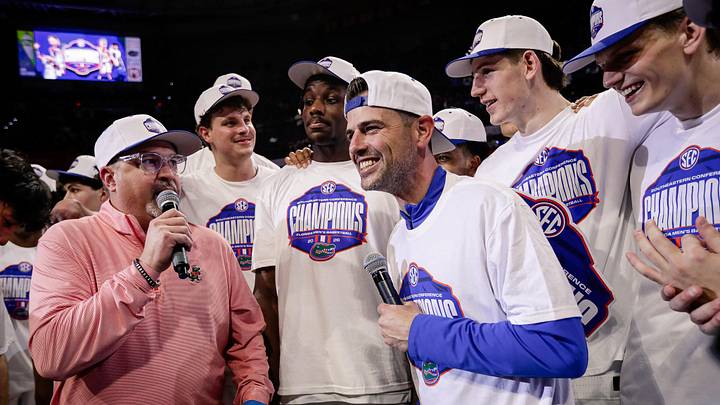 Feb 28, 2026; Gainesville, Florida, USA; Florida Gators head coach Todd Golden and players celebrate following a win over the Arkansas Razorbacks at Exactech Arena at the Stephen C. O'Connell Center. Mandatory Credit: Travis Register-Imagn Images