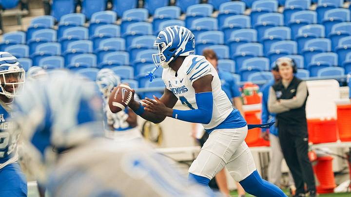 Quarterback AJ Hill (3) moves with the ball during a Memphis Tigers football spring game between the blue and gray team on Saturday, April 26, 2025 at Simmons Liberty Bank Stadium in Memphis, Tenn.
