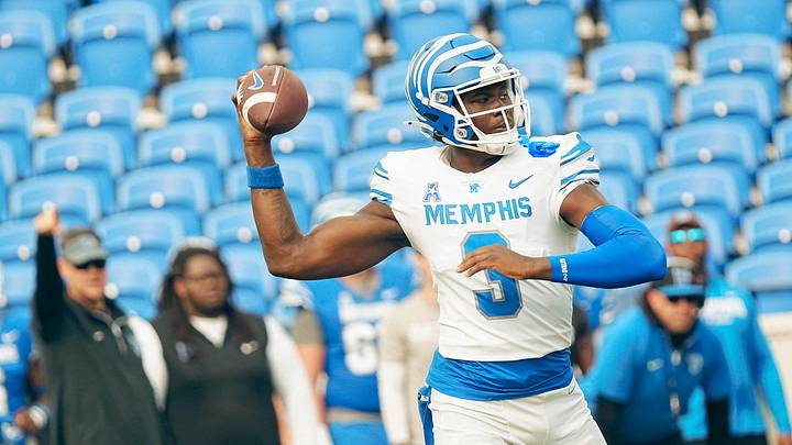 Quarterback AJ Hill (3) looks to throw the ball during a Memphis Tigers football spring game between the blue and gray team on Saturday, April 26, 2025 at Simmons Liberty Bank Stadium in Memphis, Tenn.