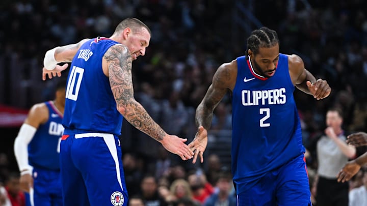 Jan 1, 2024; Los Angeles, California, USA; Los Angeles Clippers forward Kawhi Leonard (2) fives Los