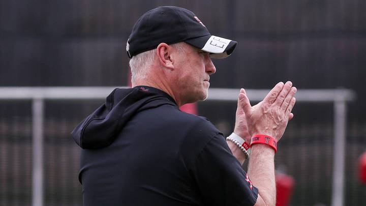 Texas Tech head coach Joey McGuire walks the field during spring football practice, Tuesday, April 14, 2026, at the Womble Football Center.