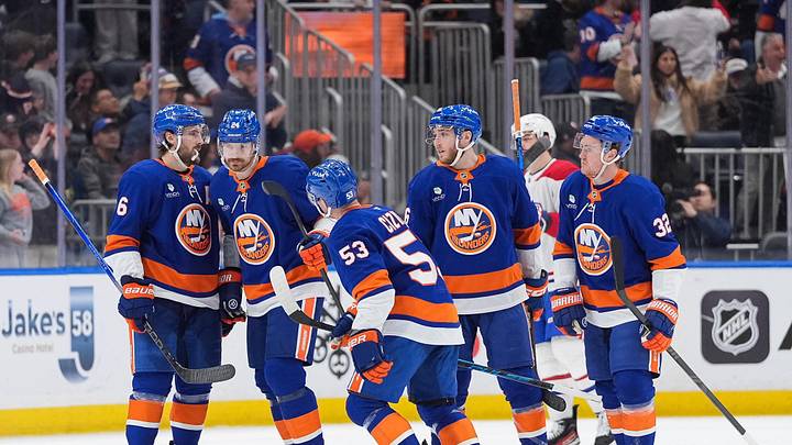 Apr 12, 2026; Elmont, New York, USA; New York Islanders center Casey Cizikas (53) celebrates a goal with defenseman Ryan Pulock (6), defenseman Scott Mayfield (24), center Marc Gatcomb (16) and center Kyle MacLean (32) against the Montreal Canadiens in the third period at UBS Arena. Mandatory Credit: Alexander Wohl-Imagn Images