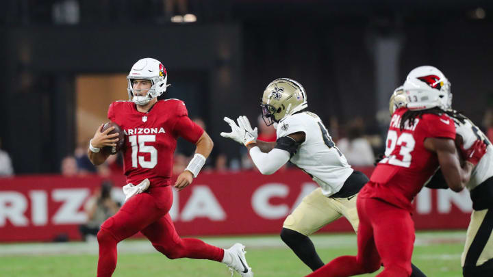 Arizona Cardinals quarterback Desmond Ridder (15) runs with the ball during a preseason game on Aug. 10, 2024 at State Farm Stadium in Glendale.