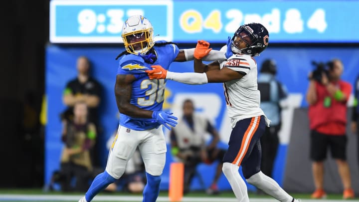 Oct 29, 2023; Inglewood, California, USA; Los Angeles Chargers cornerback Ja'Sir Taylor (36) blocks Chicago Bears wide receiver Darnell Mooney (11) during the fourth quarter at SoFi Stadium. Mandatory Credit: Jonathan Hui-USA TODAY Sports