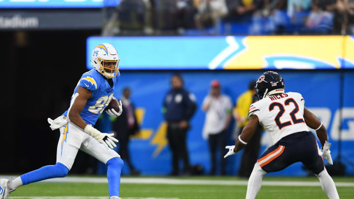 Oct 29, 2023; Inglewood, California, USA; Los Angeles Chargers tight end Donald Parham Jr. (89) runs the ball against Los Angeles Chargers safety JT Woods (22) during the first quarter at SoFi Stadium. Mandatory Credit: Jonathan Hui-USA TODAY Sports