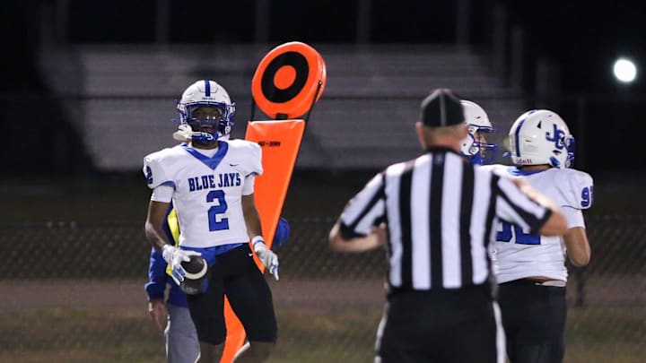 Junction City's Lovell Autry celebrates after recovering a fumble at Washburn Rural High School on Friday, Oct. 19.