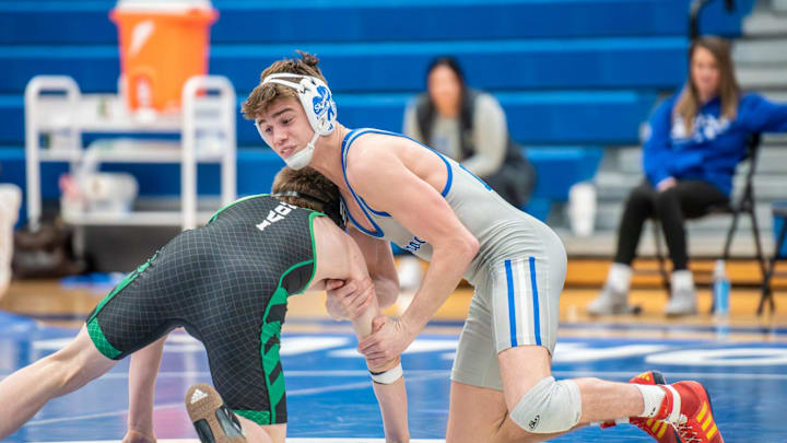Detroit Catholic Central's Wyatt Lees competes during the Division 1 team wrestling district on Wednesday, Feb. 11, 2026.