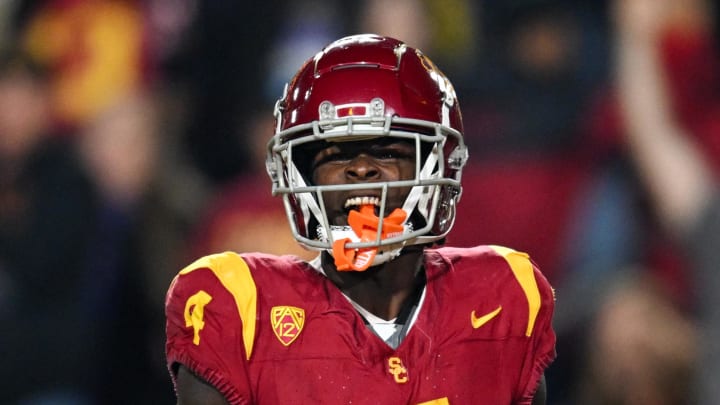 Nov 4, 2023; Los Angeles, California, USA; USC Trojans wide receiver Mario Williams (4) reacts after scoring against the Washington Huskies during the third quarter at United Airlines Field at Los Angeles Memorial Coliseum. Mandatory Credit: 