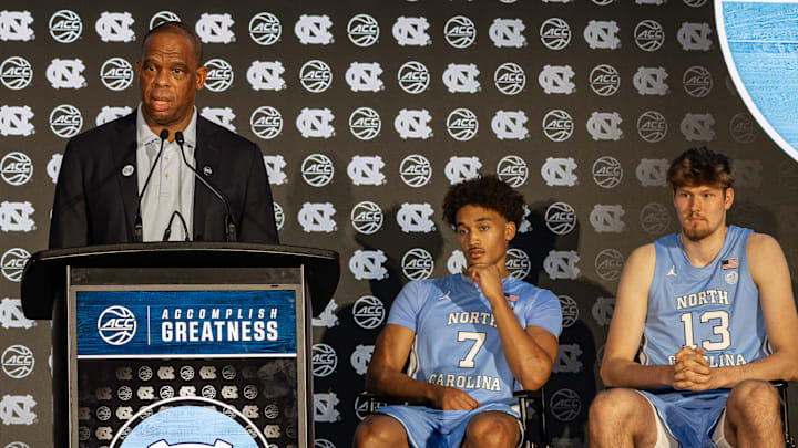 UNC head coach Hubert Davis along with players Seth Trimble and Henri Veesaar at ACC Tipoff.; Oct. 7, 2025