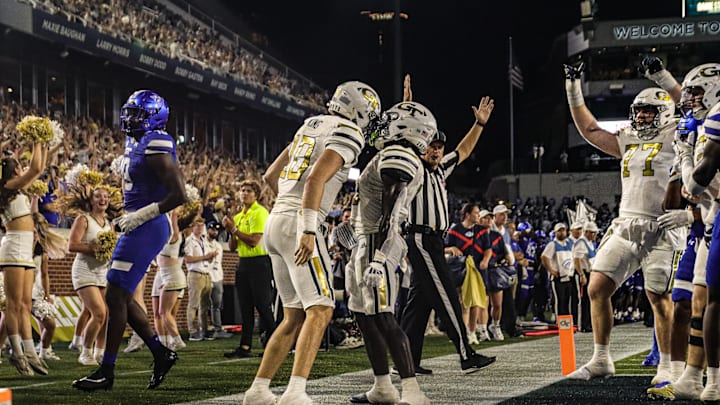 Haynes King and Jamal Haynes Celebrating 