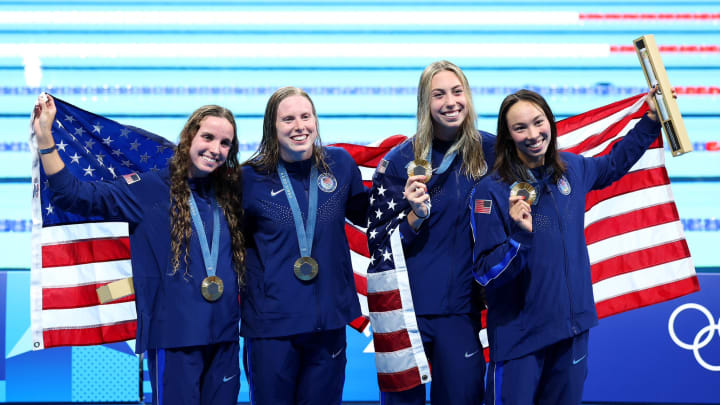 Gretchen Walsh, Kate Douglass, and Emma Weber each earned a gold medal as part of Team USA's women's 4x100 medley relay team as part of the Paris Olympics. | Virginia Athletics