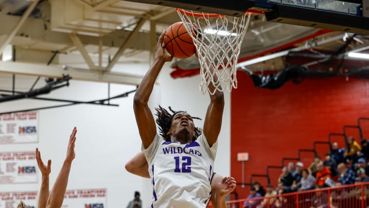 Thornton's Morez Johnson goes up for a dunk against Metamora at the Highland Shootout on January 6, 2024. 