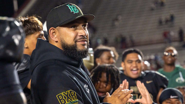 Justin Utupo's lifetime ban from coaching in the Long Beach Unified School District was reduced to three years after he won his appeal. Justin Utupo's lifetime ban from coaching in the Long Beach Unified School District was reduced to three years after he won his appeal.