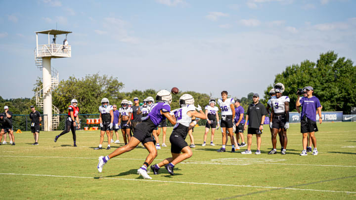 Ken Seals throwing an out route during TCU football practice