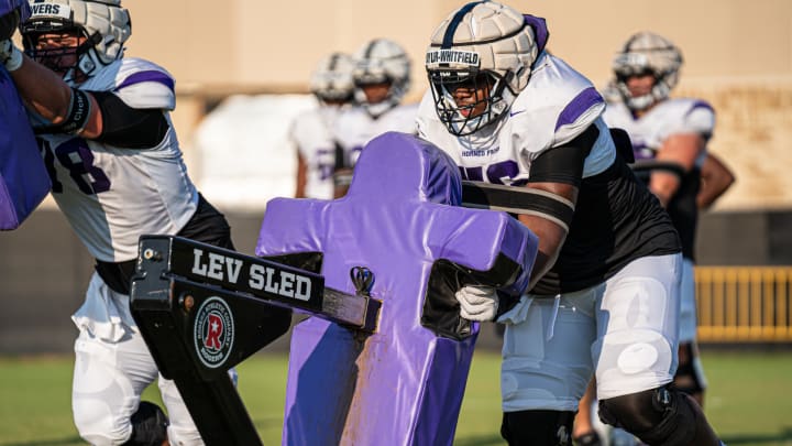 Ben Taylor-Whitfield in the middle of a blocking drill. 