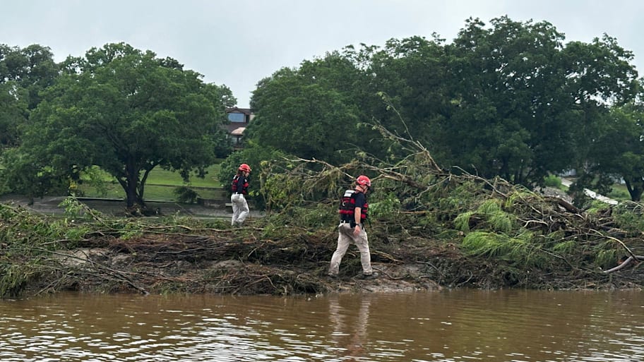 Volunteers look for victims of this month's floods in Central Texas. | Rick Jervis / USA TODAY / USA TODAY NETWORK via Imagn Images