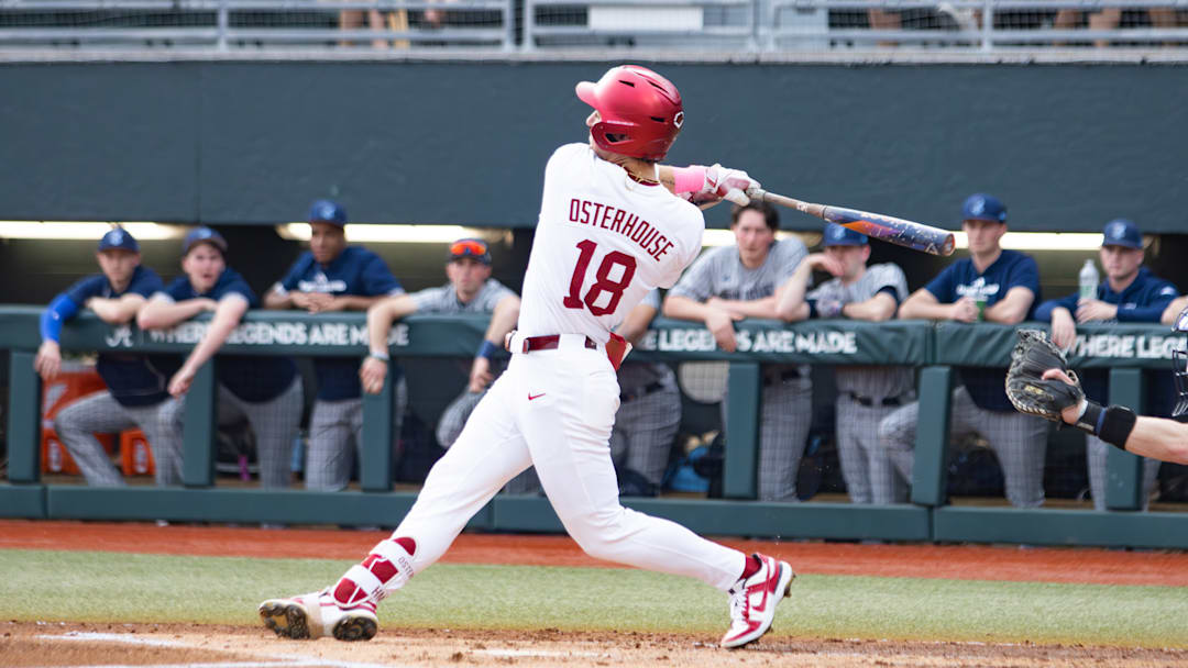 Alabama infielder Justin Osterhouse swings in the first game of the series against Rhode Island on Feb. 20, 2026.