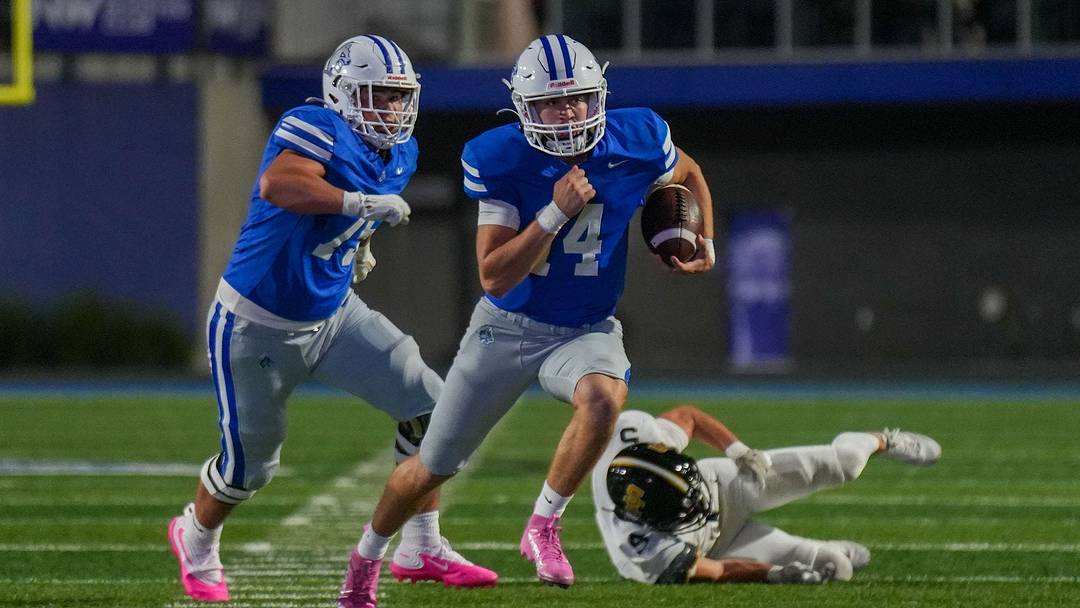 Waukee Northwest quarterback Mack Heitland runs the ball for a touchdown against Southeast Polk during a high school football game on Friday, Oct. 9, 2026, at at Waukee Northwest High School in Waukee.