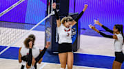 Allie Sczech celebrates scoring match point to secure Nebraska's sweep over Stanford. 