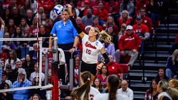 Nebraska middle blocker Andi Jackson gets a kill on the slide. She finished with an .833 hitting percentage to set a new school postseason record.