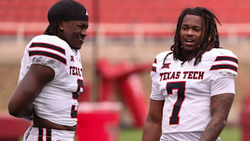 Tight ends Terrance Carter Jr. (right) and Johncarlos Miller II await the start of the Texas Tech football team's spring game, Saturday, April 19, 2025, at Jones AT&T Stadium.