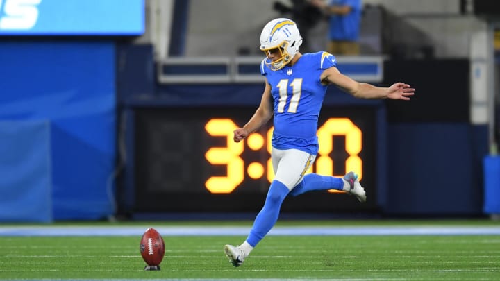 Oct 29, 2023; Inglewood, California, USA; Los Angeles Chargers place kicker Cameron Dicker (11) kicks the football against the Chicago Bears during the third quarter at SoFi Stadium. 