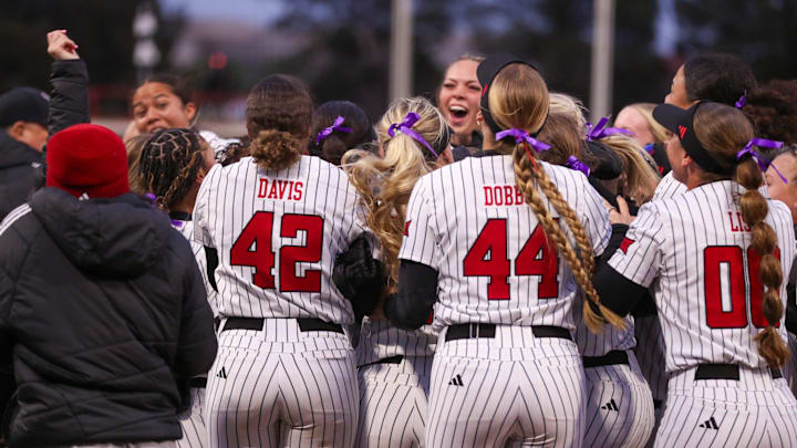 Texas Tech teammates celebrate NiJaree Canady receiving a golden ticket to the 2026 AUSL draft, Friday, March 27, 2026, at Tracy Sellers Field.