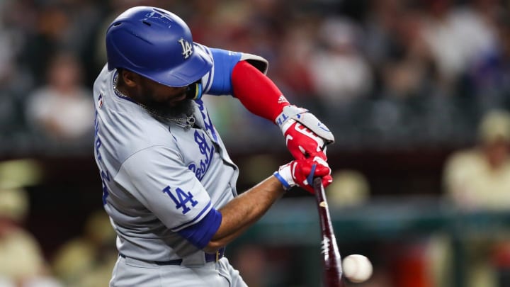 Los Angeles Dodgers outfielder Teoscar Hernandez (37) hits a ball on Aug. 30, 2024 at Chase Field in Phoenix.