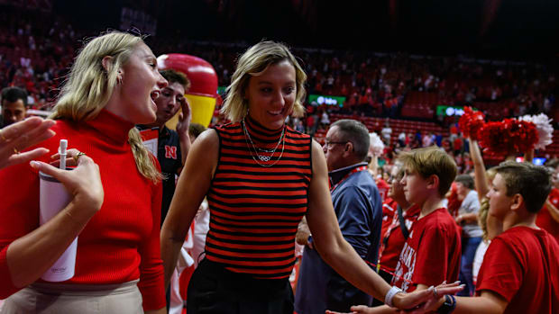 Once both Nebraska assistant coaches, Kelly (Hunter) Natter, left, and Jordan Larson, will be teammates on Nebraska's alumni 