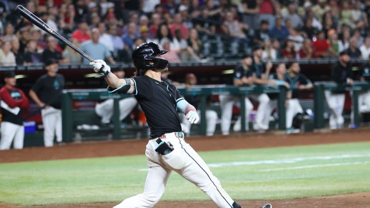 Arizona Diamondbacks outfielder Corbin Carroll (7) hits a grand slam in the eighth inning to take the lead 8-5 on Aug. 28, 2024 at Chase Field in Phoenix.