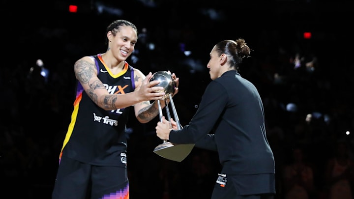 Phoenix Mercury center Brittney Griner (42) touches the 2014 WNBA Championship trophy on Friday, Sept. 13, 2024 at Footprint Center in Phoenix.